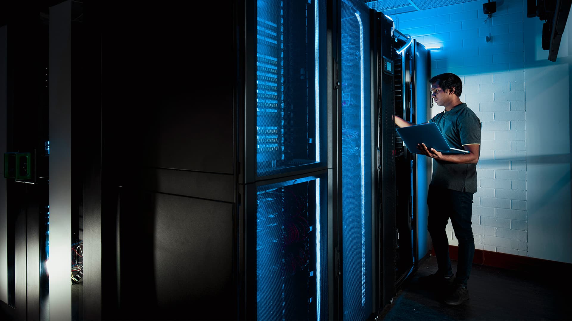 Managed IT professional in server room